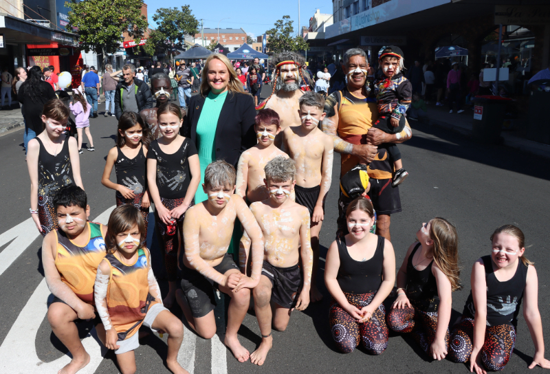 Lord Mayor Nuatali Nelmes with Uncle Alex Nean and his dancers on Nelson Street for Wallsend's 150th anniversary celebration.