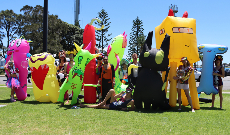 City of Newcastle's Nick Kaiser with some of the performers and inflatables that will feature in this year's New Year's Eve celebrations.