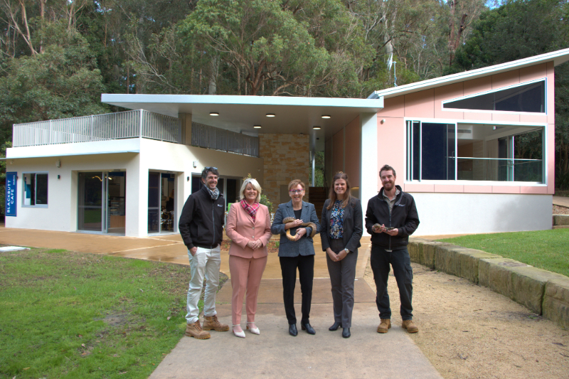 Minister for the Hunter Yasmin Catley, Member for Charlestown Jodie Harrison and City of Newcastle Executive Manager Environment and Sustainability, Marnie Kikken join Blackbutt Reserve staff and some special friends at the opening of the new $3.2 million multipurpose community facility and café.