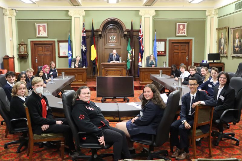 The Youth Advisory Committee helps with initiatives such as the Youth Mock Council, seen here in the former Council Chambers in 2022.