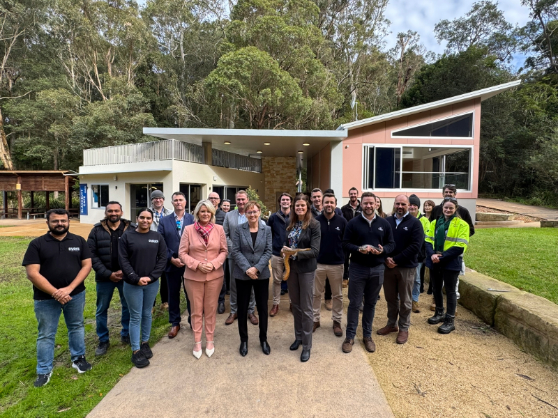 City of Newcastle staff, cafe staff, Minister for the Hunter Yasmin Catley, Member for Charlestown Jodie Harrison, City of Newcastle Executive Manager Environment and Sustainability, Marnie Kikken, with members of the construction and design teams at Blackbutt Reserve.