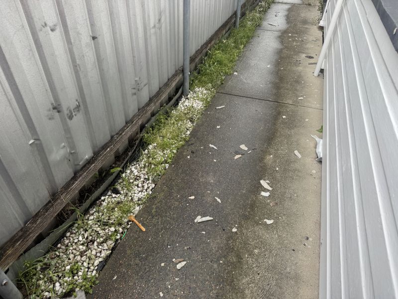 An example of suspected asbestos material found on a nearby property in Mayfield following the fire.
