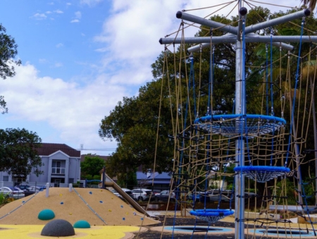 New accessible play equipment at Gregson Park, including a six-metre-high climbing tower and a balance obstacle course.