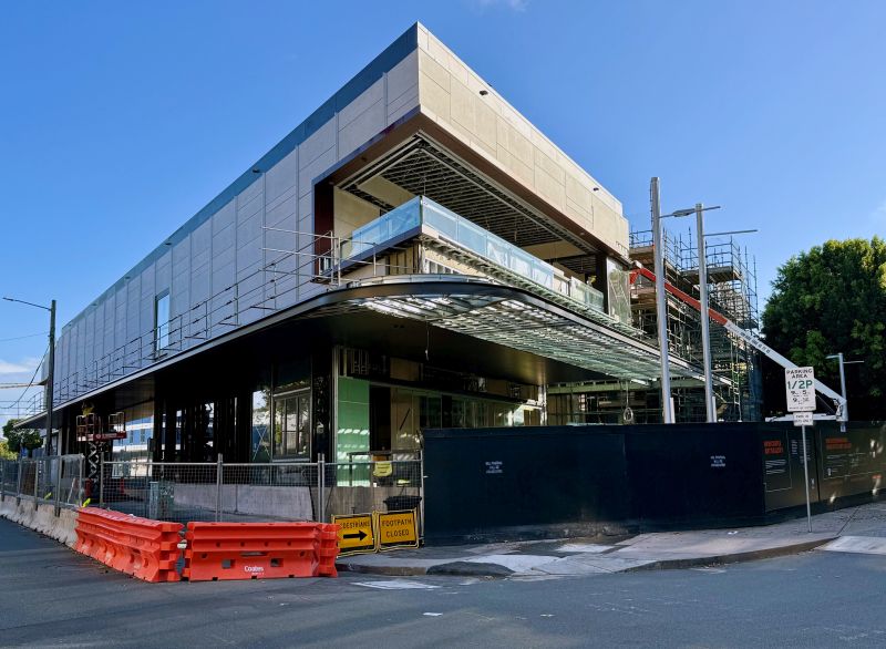 New facades along Laman and Darby streets have been revealed as the scaffolding starts to come down around the expanded Newcastle Art Gallery.